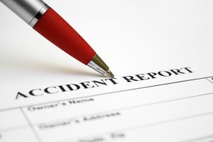 How do I ensure that a police report for the accident is filed in the absence of authorities?