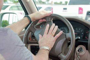 How are aggressive driving and road rage different?